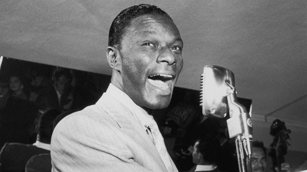 Nat King Cole singing